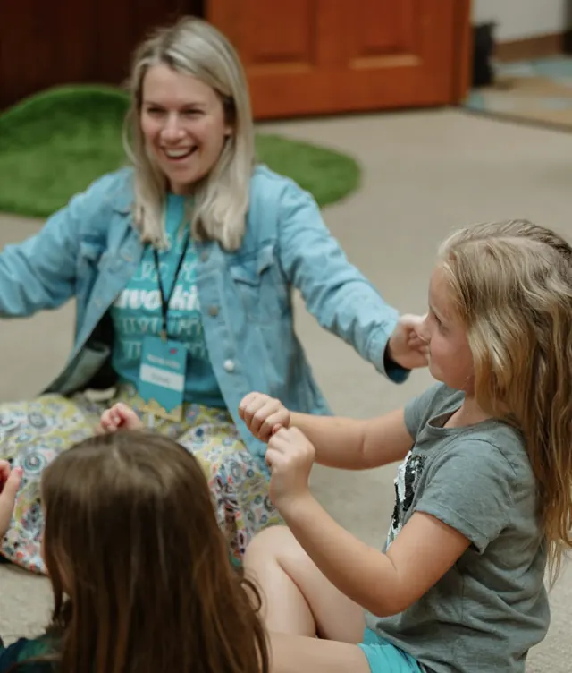 Nuvo Kids small group leader playing a game with kids at church in Dublin, Ohio