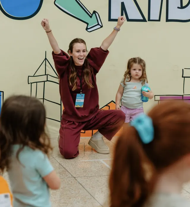 Nuvo Kids leader cheering with toddlers and preschoolers at church in Northwest Columbus