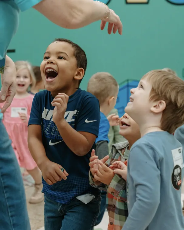 Preschool kids laughing during Nuvo Kids at a church in Dublin and Columbus, Ohio