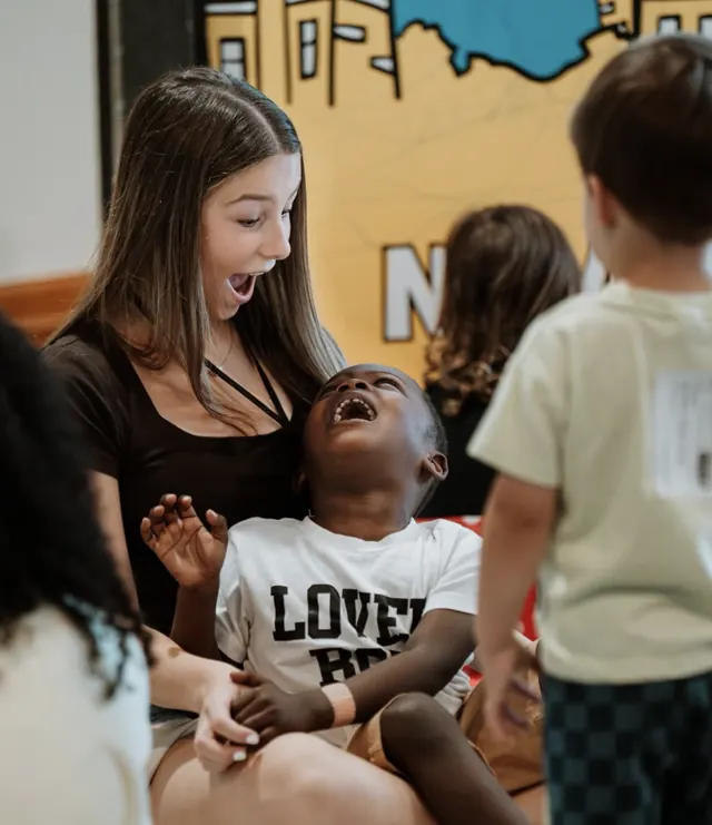 Volunteer and toddler laughing at Nuvo Kids in Dublin, Ohio