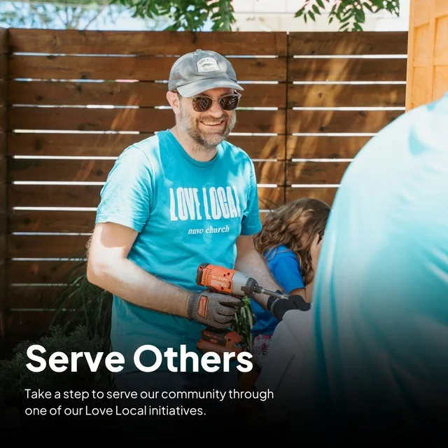 Love Local volunteer with a drill building a fence for a neighbor with Nuvo Church in Dublin and Columbus, Ohio