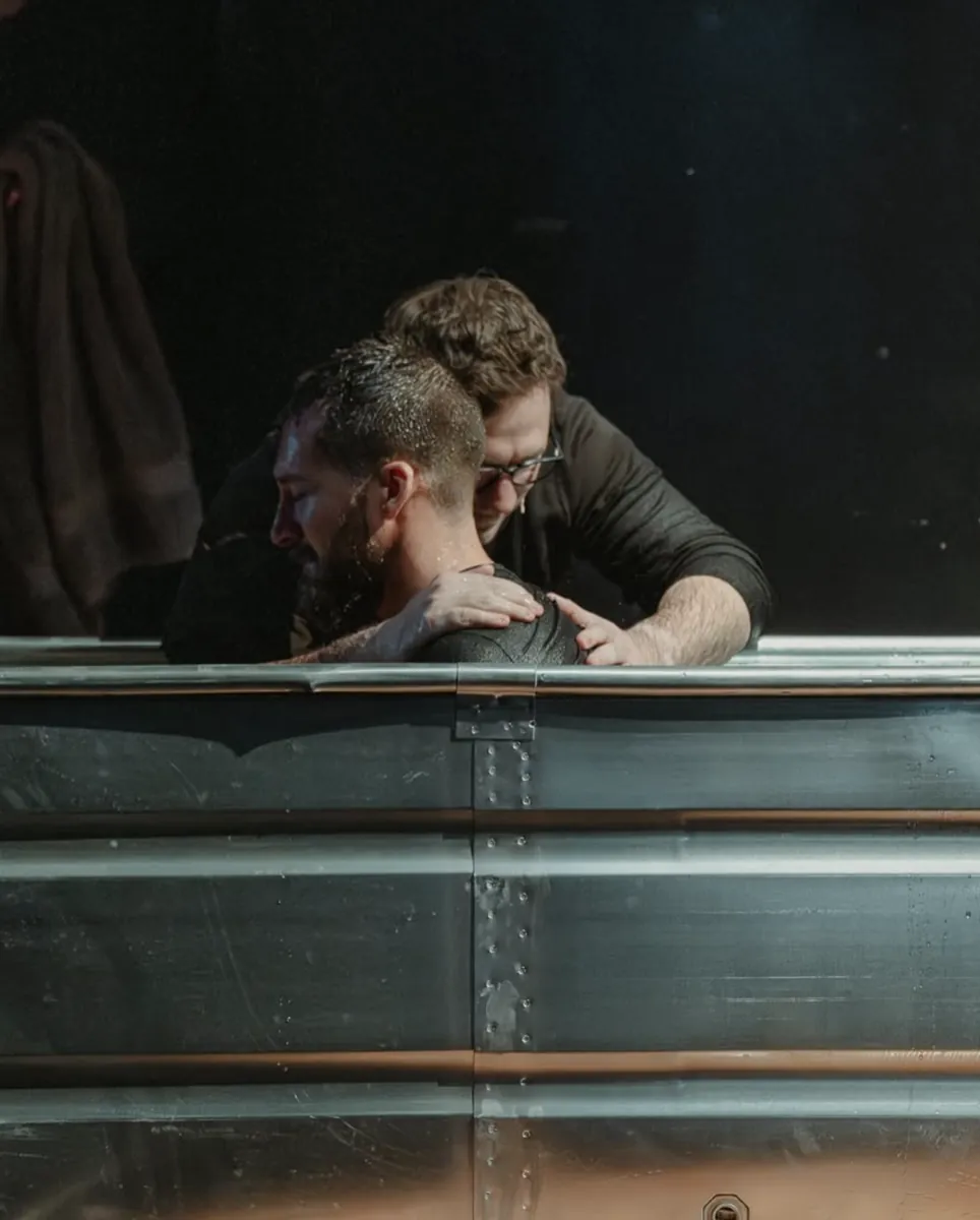Man being baptized by a pastor at Nuvo Church in Dublin, Ohio