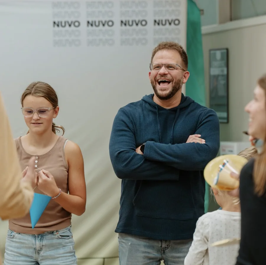 Travis laughing with his family at Nuvo Church in Dublin, Ohio
