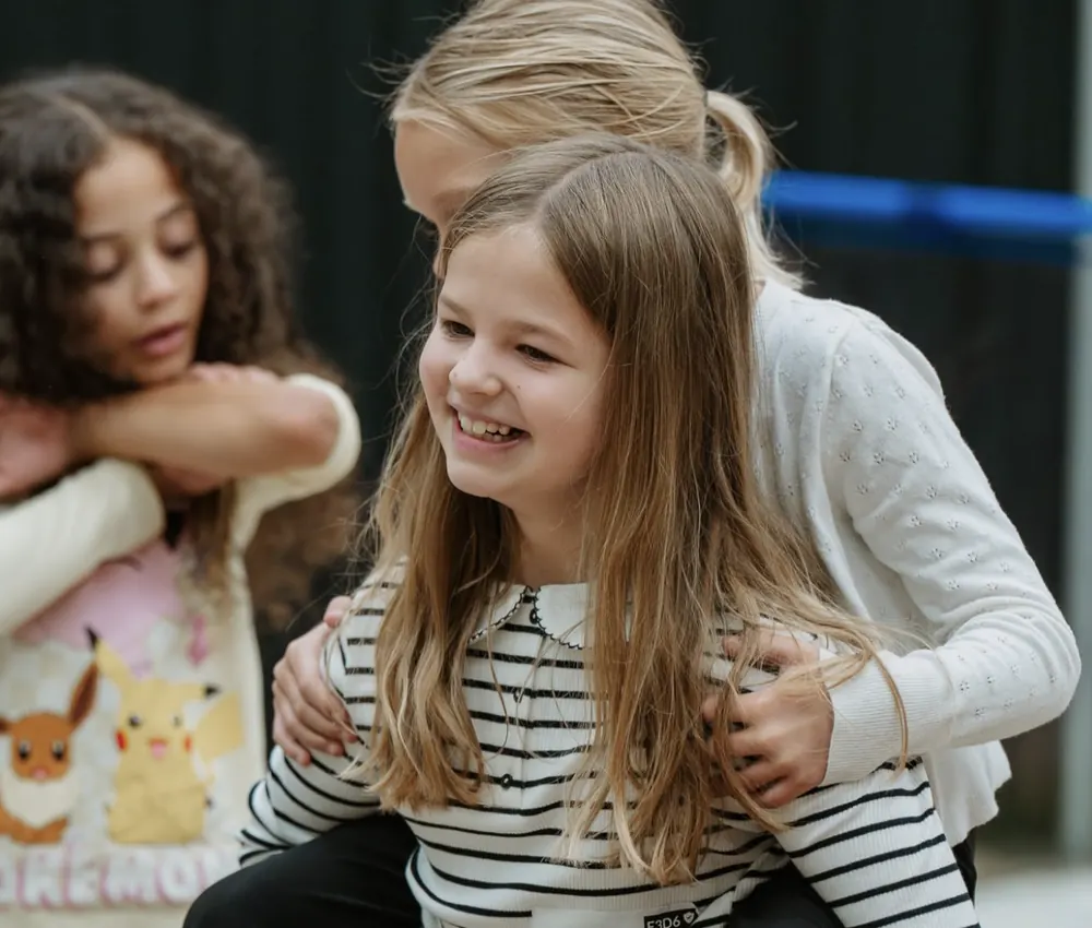 Kids playing piggyback at Nuvo Kids at Nuvo Church in Columbus, Ohio