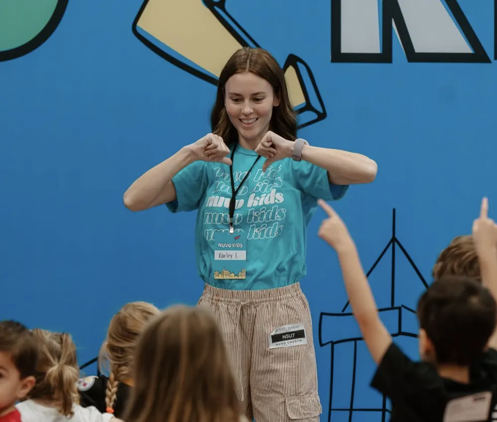 Nuvo Kids leader leading worship with kids at Nuvo Church in Columbus, Ohio