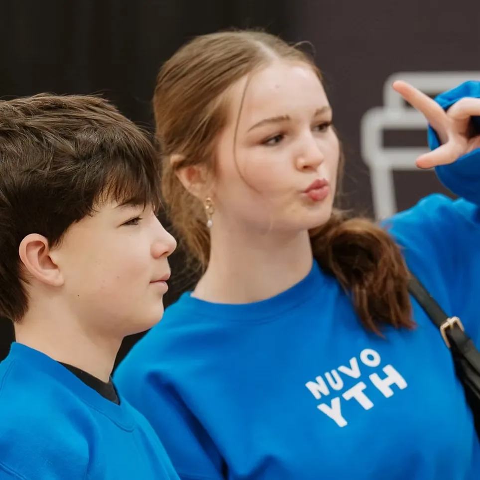 Middle and high school students in Nuvo YTH sweatshirts at Nuvo Church in Columbus