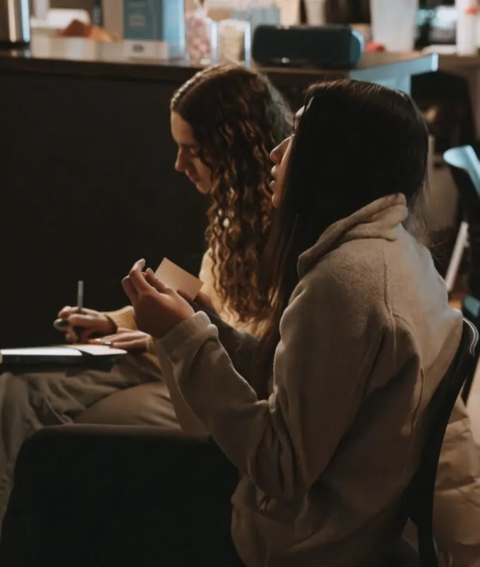 High school girls taking notes during the message at Nuvo YTH in Dublin, Ohio