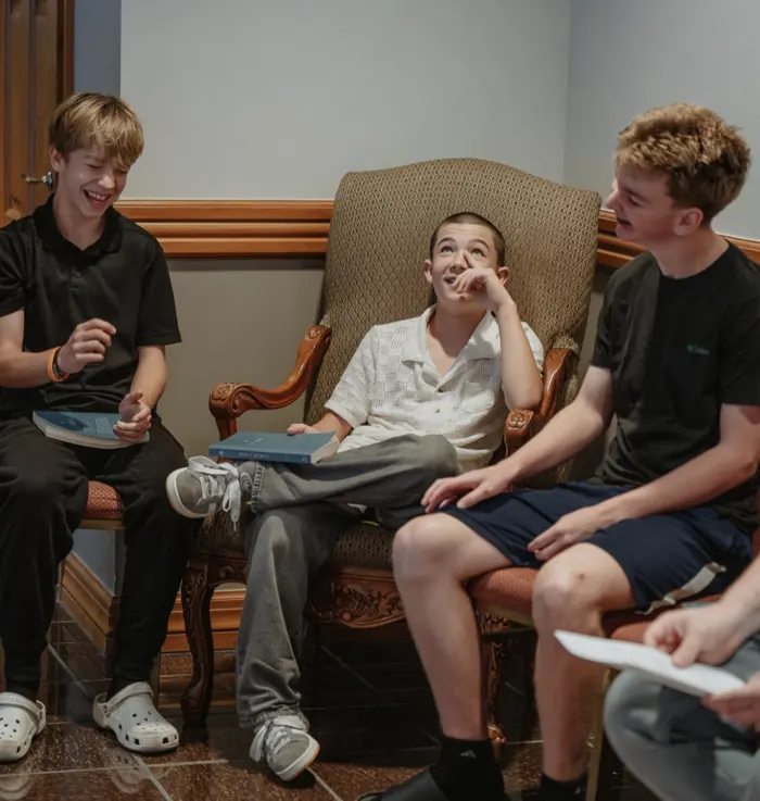 High school guys laughing in a Bible small group at Nuvo YTH in Columbus