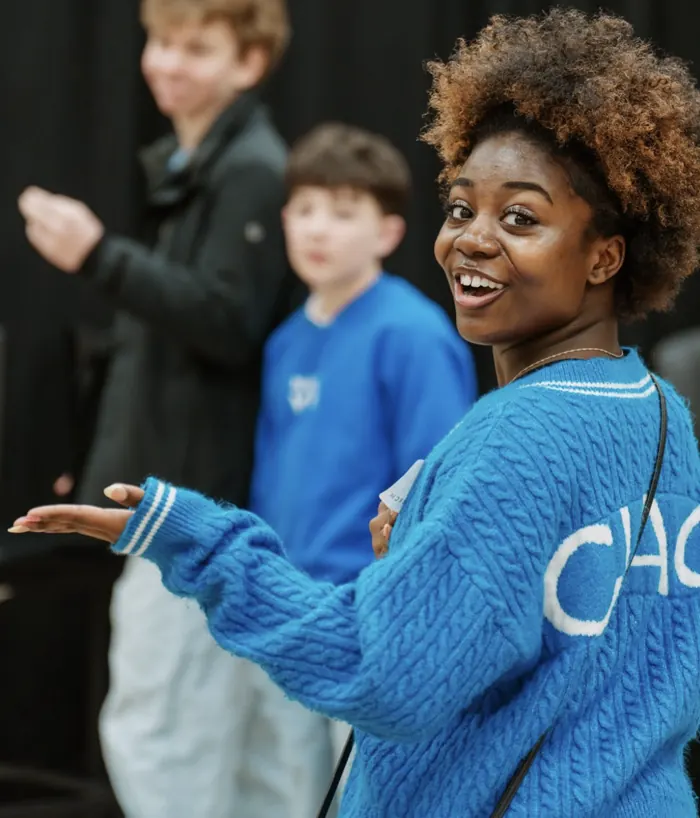 Smiling Nuvo YTH leader serving with students at Nuvo Church in Northwest Columbus
